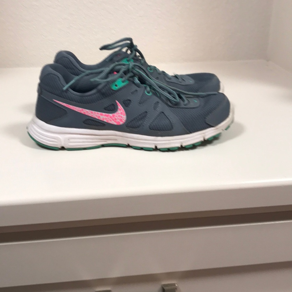 Nike running shoes.  Size 10